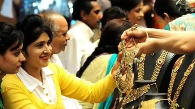 Dhanteras is marked by buying of jewellery and metal utensils to symbolise prosperity.(HT file photo)