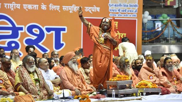 Seers converged at Talkatora Stadium in New Delhi on Saturday for ‘Dharmadesh’, a two-day ‘national integration’ meeting to push for the construction of a Ram temple in Ayodhya. (Sonu Mehta/HT PHOTO) Seers converged at Talkatora Stadium in New Delhi on Saturday for ‘Dharmadesh’, a two-day ‘national integration’ meeting to push for the construction of a Ram temple in Ayodhya. (Sonu Mehta/HT PHOTO)