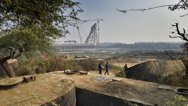 The still under construction Signature Bridge seen in January 2017. Fourteen years in the making, the bridge will reduce the travel time between north and northeast Delhi and will be developed into a tourist spot in the second phase of its development. (Ajay Aggarwal / HT Archive) 