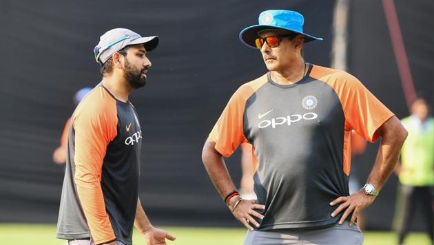 Captain of the Indian T20 cricket team Rohit Sharma (L) talks with coach Ravi Shastri during the team's practice session on the eve of first T20 cricket match between India and West Indies at the Eden Gardens (AFP) Captain of the Indian T20 cricket team Rohit Sharma (L) talks with coach Ravi Shastri during the team's practice session on the eve of first T20 cricket match between India and West Indies at the Eden Gardens (AFP)