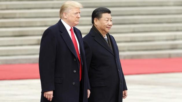 Donald Trump, with Xi Jinping on November 9, 2017. President Donald Trump’s newfound zeal to resolve his trade war with China risks hitting some familiar obstacles, including himself. (Bloomberg Photo) Donald Trump, with Xi Jinping on November 9, 2017. President Donald Trump’s newfound zeal to resolve his trade war with China risks hitting some familiar obstacles, including himself. (Bloomberg Photo)