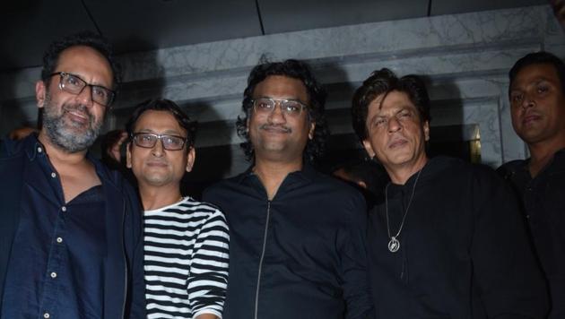 Actor Shah Rukh Khan with director Aanand L Rai, and singer Atul during his birthday celebration in Mumbai.(IANS)