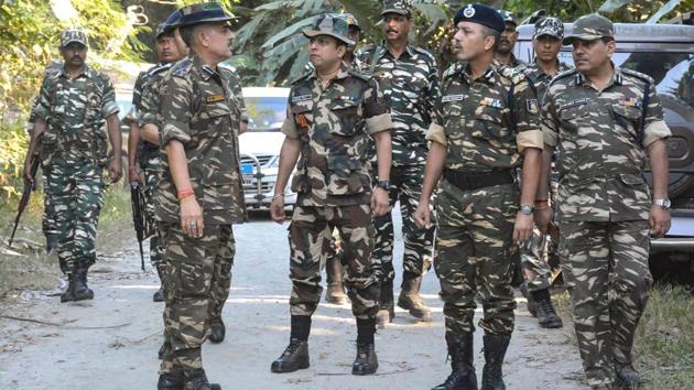 CRPF officials inspect the area after five people were killed by suspected United Liberation Front of Assam (ULFA) , at Tinsukia district of Assam, on November 2.(PTI Photo)