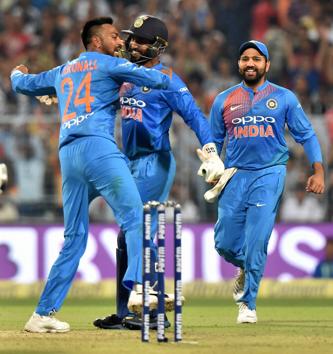 Kolkata: Indian bowler Krunal Pandey celebrates the wicket of West Indies batsman K Pollard during the 1st T20 match against West Indies at Eden Garden in Kolkata. (PTI)