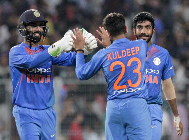 India's Kuldeep Yadav, center, celebrates with teammates the dismissal of West Indies' Darren Bravo during the first Twenty20 international cricket match between India and West Indies in Kolkata. (AP)