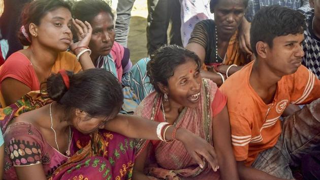 Relatives mourn the death of a family member killed by suspected United Liberation Front of Assam (ULFA) in Tinsukia district of Assam on November 2.(PTI Photo)