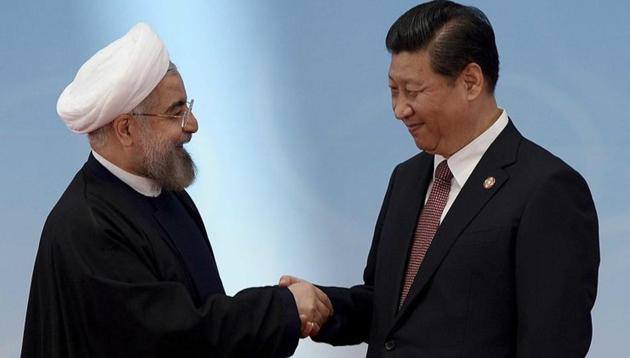 Chinese President Xi Jinping (R) and Iranian President Hassan Rouhani (L)(Reuters)
