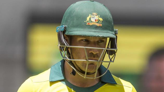 Aaron Finch walks off after being dismissed during the first one-day international (ODI) cricket match against South Africa.(AFP)