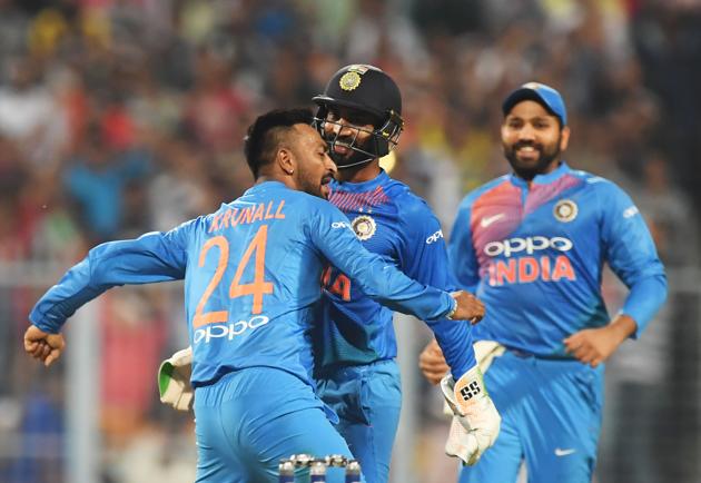 Indian cricketer Krunal Pandya (L) celebrates with teammates after taking the wicket of West Indies cricketer Kieron Pollard during the first T20 cricket match between India and West Indies at the Eden Gardens. (AFP) Indian cricketer Krunal Pandya (L) celebrates with teammates after taking the wicket of West Indies cricketer Kieron Pollard during the first T20 cricket match between India and West Indies at the Eden Gardens. (AFP)