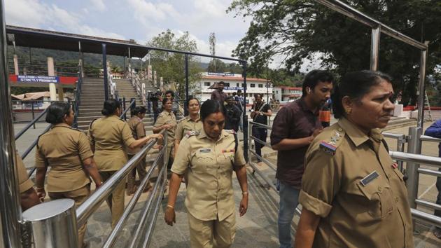 Devices to block phone calls and other radio signals, commandos and some 2,300 police personnel, including women officers above the age of 50 in a three tier system were put in place at the Lord Ayyappa shrine and its base camps, with the Sabarimala temple’s doors scheduled to open at 5pm Monday for a special one-day puja. (Manish Swarup / AP) Devices to block phone calls and other radio signals, commandos and some 2,300 police personnel, including women officers above the age of 50 in a three tier system were put in place at the Lord Ayyappa shrine and its base camps, with the Sabarimala temple’s doors scheduled to open at 5pm Monday for a special one-day puja. (Manish Swarup / AP)