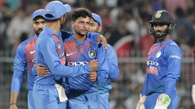 Kuldeep Yadav celebrates with teammates the dismissal of West Indies' captain Carlos Brathwaite.(AP)
