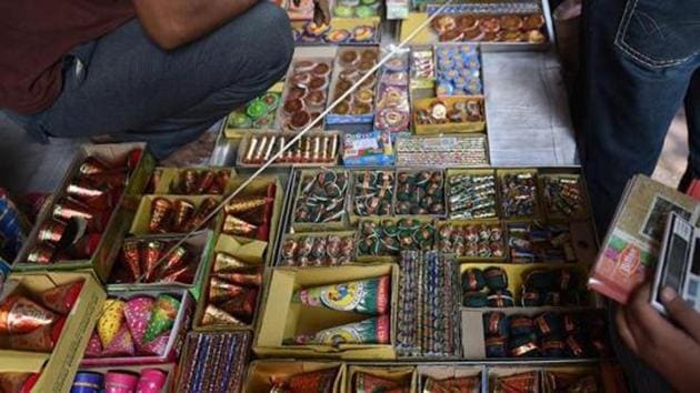 Most firecracker sellers are offering two options: home delivery, with half the cost being paid upfront; or an over-the-counter sale of firecrackers not costing more than Rs 500.(AFP File Photo) Most firecracker sellers are offering two options: home delivery, with half the cost being paid upfront; or an over-the-counter sale of firecrackers not costing more than Rs 500.(AFP File Photo)