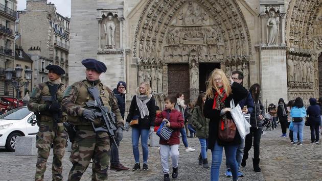 Soldiers patrol at the Notre Dame cathedral in Paris, France. Eleven people died in a Pittsburgh synagogue last month when an anti-Semitic gunman burst inside, raging against Jews. It ranked among the deadliest attacks on Jews in the United States, a country founded on religious tolerance and a spirit of welcome in houses of worship. (Michel Euler / AP)