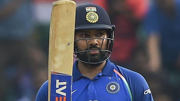 Rohit Sharma celebrates his half century during the 5th and final ODI cricket match against West Indies.(AP)