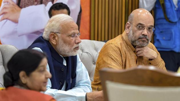 Prime Minister Narendra Modi, BJP president Amit Shah and external affairs minister Sushma Swaraj during the party's Central Election Committee meeting in New Delhi. (AP) Prime Minister Narendra Modi, BJP president Amit Shah and external affairs minister Sushma Swaraj during the party's Central Election Committee meeting in New Delhi. (AP)