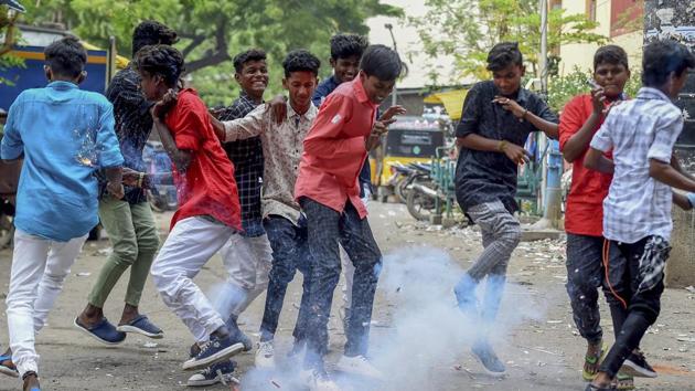 Youngsters burst firecrackers as they celebrate Diwali in Chennai. People in Tamil Nadu began celebrating Diwali, starting off with special sesame oil bath, wearing new clothes and bursting firecrackers. (R Senthil Kumar / AP) Youngsters burst firecrackers as they celebrate Diwali in Chennai. People in Tamil Nadu began celebrating Diwali, starting off with special sesame oil bath, wearing new clothes and bursting firecrackers. (R Senthil Kumar / AP)