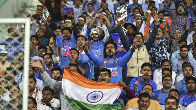 Indian fans cheer during the 2nd T20I match between India and West Indies at Bharat Ratna Atal Bihari Vajpayee International Cricket Stadium in Lucknow, Nov. 6, 2018.(AP)