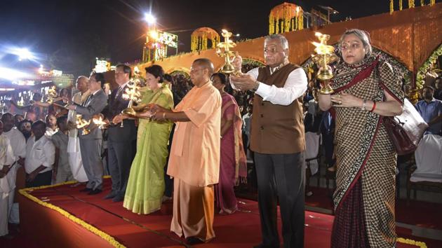 Uttar Pradesh chief minister Yogi Adityanath, chief guest South Korean First Lady Kim Jung-sook, MoS for External Affairs V K Singh and others perform 'arti' of Saryu River during grand Diwali celebrations 'Deepotsav', in Ayodhya on Tuesday. (AP) Uttar Pradesh chief minister Yogi Adityanath, chief guest South Korean First Lady Kim Jung-sook, MoS for External Affairs V K Singh and others perform 'arti' of Saryu River during grand Diwali celebrations 'Deepotsav', in Ayodhya on Tuesday. (AP)