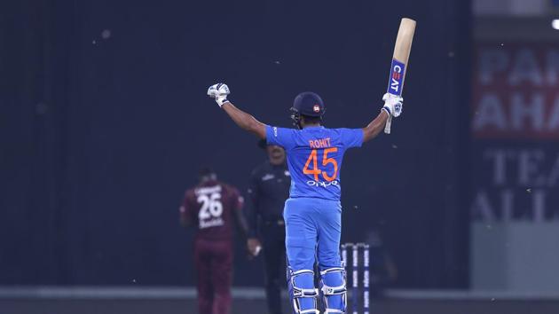 India's Rohit Sharma celebrates after scoring a hundred during the second Twenty20 international cricket match between India and West Indies at Bharat Ratna Shri Atal Bihari Vajpayee Ekana Cricket Stadium in Lucknow. (AP)