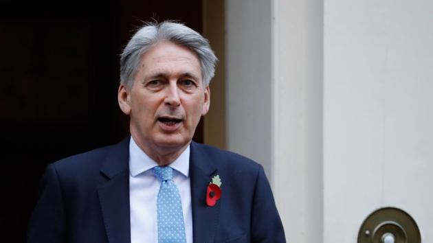 Britain's Chancellor of the Exchequer Philip Hammond leaves 11 Downing Street in London on October 31, 2018.(AFP)