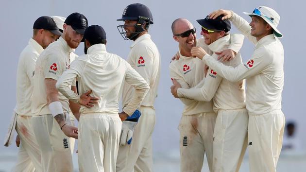 Jack Leach (C) celebrates with Jos Buttler (2nd R) and his teammates after taking the wicket of Dilruwan Perera. (REUTERS) Jack Leach (C) celebrates with Jos Buttler (2nd R) and his teammates after taking the wicket of Dilruwan Perera. (REUTERS)