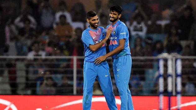 Khaleel Ahmed (right) celebrates the fall of a West Indies wicket with Bhuvneshwar Kumar. (AFP) Khaleel Ahmed (right) celebrates the fall of a West Indies wicket with Bhuvneshwar Kumar. (AFP)