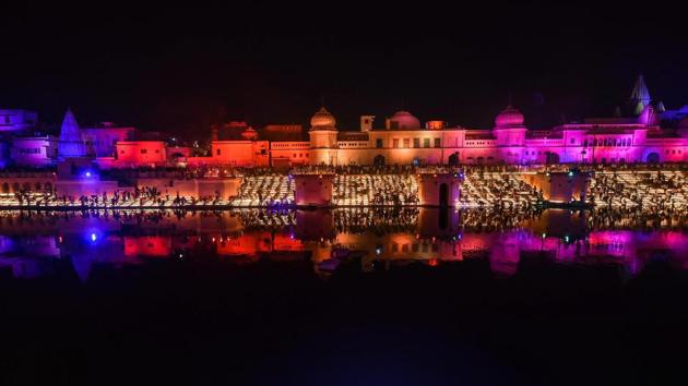 People light earthen lamps on the banks of River Saryu during Deepotsav in Ayodhya, Uttar Pradesh. (Nand Kumar / PTI) People light earthen lamps on the banks of River Saryu during Deepotsav in Ayodhya, Uttar Pradesh. (Nand Kumar / PTI)