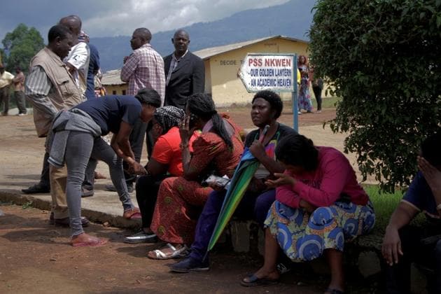 Parents await for news of their children at a school where 79 pupils were kidnapped in Bamenda, Cameroon November 6, 2018.(REUTERS)
