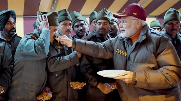 Prime Minister Narendra Modi celebrated Diwali with the jawans of the Indian Army and ITBP, at Harsil, in Uttarakhand. (PTI) Prime Minister Narendra Modi celebrated Diwali with the jawans of the Indian Army and ITBP, at Harsil, in Uttarakhand. (PTI)