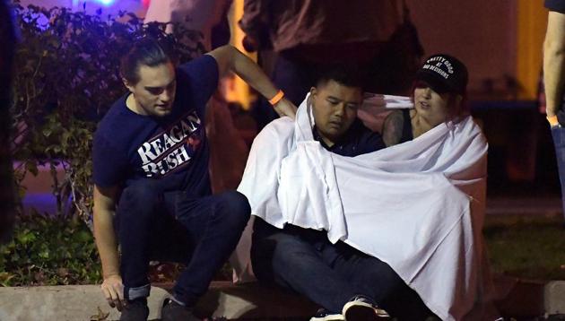 A 28-year-old former Marine opened fire in a California country music bar packed with college students, killing 12 people including a police officer as dozens of terrified youngsters stampeded towards the door, authorities said Thursday. (AP) A 28-year-old former Marine opened fire in a California country music bar packed with college students, killing 12 people including a police officer as dozens of terrified youngsters stampeded towards the door, authorities said Thursday. (AP)