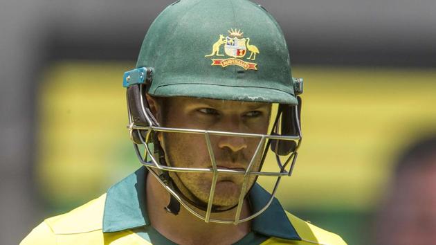 Australia's captain Aaron Finch walks off after being dismissed during the first one-day international (ODI) cricket match between South Africa and Australia at the Optus Stadium in Perth.(AFP)