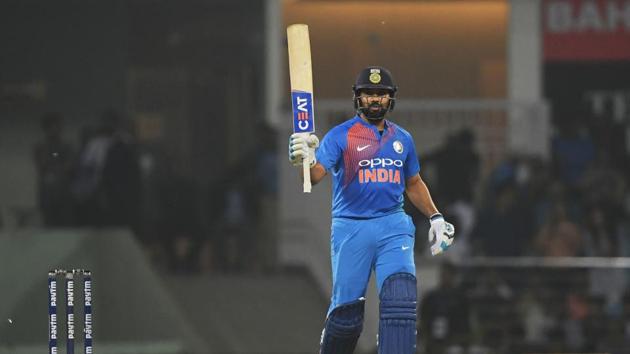 Indian opener Rohit Sharma’s century in the last match in Lucknow, made him the only batsman to score 4 centuries in cricket’s shortest format at the international arena. The Mumbai batsman has 2203 runs to his name currently and needs to score 69 runs against West Indies in the last match of the series on Sunday to get past Martin Guptill and become the leading run-getter in T20 internationals. (Money Sharma / AFP) Indian opener Rohit Sharma’s century in the last match in Lucknow, made him the only batsman to score 4 centuries in cricket’s shortest format at the international arena. The Mumbai batsman has 2203 runs to his name currently and needs to score 69 runs against West Indies in the last match of the series on Sunday to get past Martin Guptill and become the leading run-getter in T20 internationals. (Money Sharma / AFP)