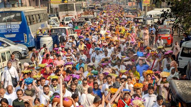 Devotees carry offerings on their head while trekking to the Govardhan Hill to celebrate the Hindu festival of 'Govardhan Puja' near Mathura. (PTI) Devotees carry offerings on their head while trekking to the Govardhan Hill to celebrate the Hindu festival of 'Govardhan Puja' near Mathura. (PTI)