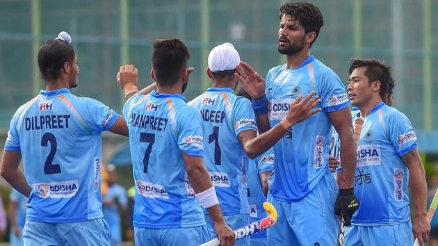 File photo: Indian players celebrate after scoring a goal during a match.(PTI)