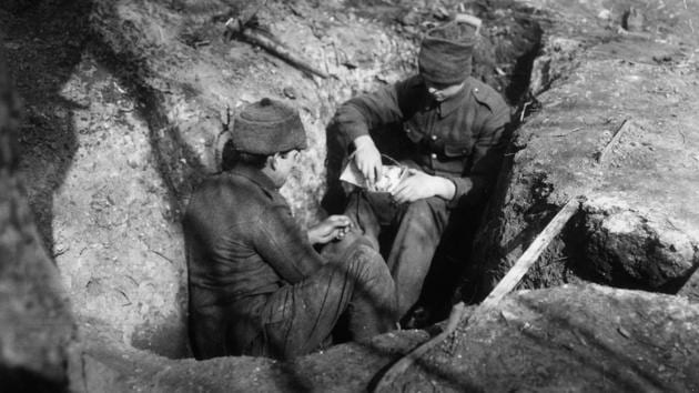 Circa 1915: British soldiers making grenades from tins in the trenches. The hand grenade and its variants became a favourite among troops on rotation in trenches. Requiring minimal accuracy or exposure to oncoming fire, both sides were quick to raise specialist grenadier regiments. (Hulton Archive / Getty Images) Circa 1915: British soldiers making grenades from tins in the trenches. The hand grenade and its variants became a favourite among troops on rotation in trenches. Requiring minimal accuracy or exposure to oncoming fire, both sides were quick to raise specialist grenadier regiments. (Hulton Archive / Getty Images)