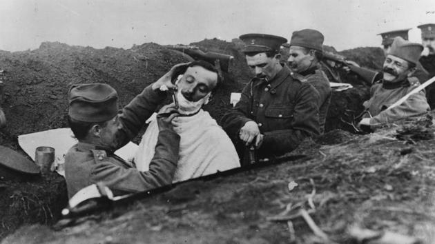 Circa 1916: A soldier gets a shave in a Serbian trench. Daytime was most often quiet on the front, snipers or artillery making movement perilous. The hours were utilised instead for humdrum routine work --the maintenance of barbed wire, general trench upkeep, or as pictured here. (Hulton Archive / Getty Images) Circa 1916: A soldier gets a shave in a Serbian trench. Daytime was most often quiet on the front, snipers or artillery making movement perilous. The hours were utilised instead for humdrum routine work --the maintenance of barbed wire, general trench upkeep, or as pictured here. (Hulton Archive / Getty Images)