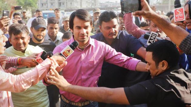 Former minister of Bihar and senior leader of RJD Tej Pratap Yadav arrives in Ranchi to meet with his father Lalu Prasad Yadav at Rajednra Institute of Medical Science (RIMS) on Saturday, November 3. (PTI Photo) Former minister of Bihar and senior leader of RJD Tej Pratap Yadav arrives in Ranchi to meet with his father Lalu Prasad Yadav at Rajednra Institute of Medical Science (RIMS) on Saturday, November 3. (PTI Photo)