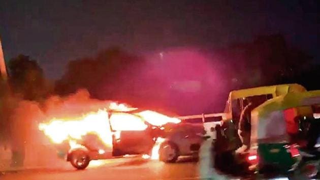 In the video, Chandel is seen running behind the car before the vehicle hit an auto on the Rajeev Chowk flyover. (Sourced) In the video, Chandel is seen running behind the car before the vehicle hit an auto on the Rajeev Chowk flyover. (Sourced)