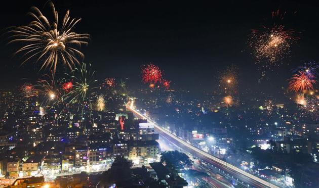 A long -exposure picture of people bursting firecrackers in Dhankawadi area, shot from Ganga Ishannya tower. (Pratham Gokhale/HT Photo) A long -exposure picture of people bursting firecrackers in Dhankawadi area, shot from Ganga Ishannya tower. (Pratham Gokhale/HT Photo)