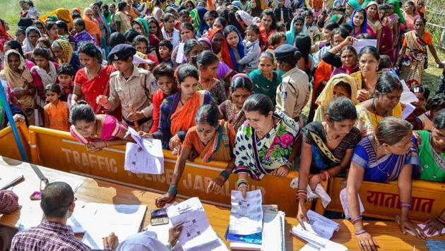Women show their proofs of identity before entering the Netaji Subhash Chandra Bose Central Jail to meet their brothers on the occasion of ‘Bhai Dooj’, in Jabalpur. (PTI) Women show their proofs of identity before entering the Netaji Subhash Chandra Bose Central Jail to meet their brothers on the occasion of ‘Bhai Dooj’, in Jabalpur. (PTI)