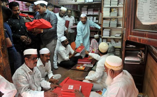 Traders carry out puja of their account books on the occasion of Dhanteras at Bohari Ali, Raviwar peth.On this day, Hindus consider it as an extremely auspicious to make new purchases, especially gold or silver articles and new utensils. It is believed that new “Dhan” (wealth) or some form of precious metal is a sign of good luck. In modern times, Dhanteras has come to be known as the most auspicious occasion for buying gold, silver and other metals especially kitchenware. Traders do puja of their account books so as to see prosperity in trade. (HT PHOTO) Traders carry out puja of their account books on the occasion of Dhanteras at Bohari Ali, Raviwar peth.On this day, Hindus consider it as an extremely auspicious to make new purchases, especially gold or silver articles and new utensils. It is believed that new “Dhan” (wealth) or some form of precious metal is a sign of good luck. In modern times, Dhanteras has come to be known as the most auspicious occasion for buying gold, silver and other metals especially kitchenware. Traders do puja of their account books so as to see prosperity in trade. (HT PHOTO)