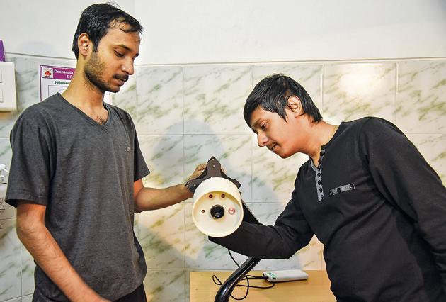 Deepak Kumar (L), founder, Epocare private limited and Kumar Kalika, co-founder, with the wound healing assessment and prediction (Whap) tissue imaging technology gadget. The duo intend on using it on 200 or more patients with foot injury. (Sanket Wankhade/HT PHOTO) Deepak Kumar (L), founder, Epocare private limited and Kumar Kalika, co-founder, with the wound healing assessment and prediction (Whap) tissue imaging technology gadget. The duo intend on using it on 200 or more patients with foot injury. (Sanket Wankhade/HT PHOTO)