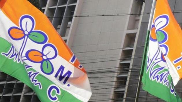 Supporters waving Trinamool Congress party flags in Kolkata.(AP Photo)