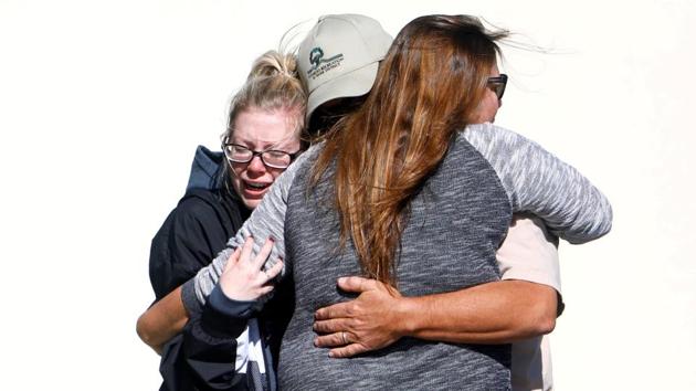 Mourners react outside a reception centre for families of victims of a mass shooting in Thousand Oaks, California. (Eric Thayer / REUTERS) Mourners react outside a reception centre for families of victims of a mass shooting in Thousand Oaks, California. (Eric Thayer / REUTERS)