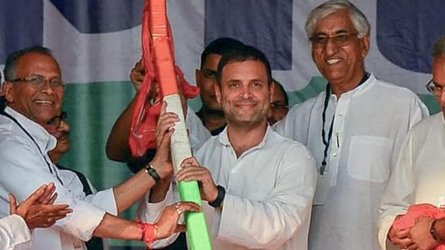 Congress President Rahul Gandhi being presented a model of plough during the Kisan Hunkar Rally in Raipur, Chhattisgarh, Monday, Oct 22, 2018. The main contest in the assembly elections in the state will be between the Congress and the ruling BJP.(PTI File)