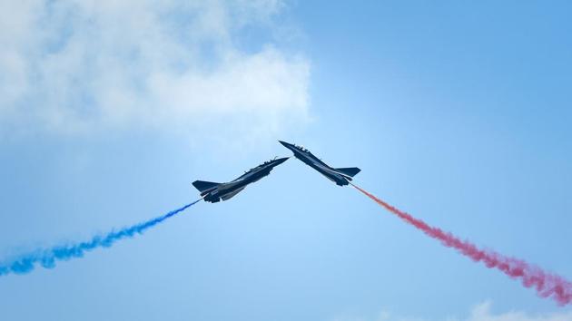 J-10 fighter jets of the Bayi Aerobatic Team of PLA’s (Peoples Liberation Army) Air Force perform at the Airshow China 2018 in Zhuhai, south China’s Guangdong province. (Wang Zhao / AFP) J-10 fighter jets of the Bayi Aerobatic Team of PLA’s (Peoples Liberation Army) Air Force perform at the Airshow China 2018 in Zhuhai, south China’s Guangdong province. (Wang Zhao / AFP)