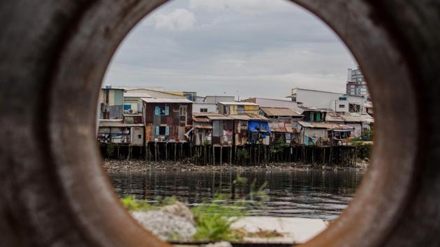 Houses on the Te canal in Ho Chi Minh City. Today, the tide may be turning again. “There’s a new elite that’s emerging that’s retransforming (canals) into an aesthetic place where you might sit and capture cool breezes and have views,” Erik Harms, author of “Luxury and Rubble” about development in the city, told AFP. (Kao Nguyen / AFP)