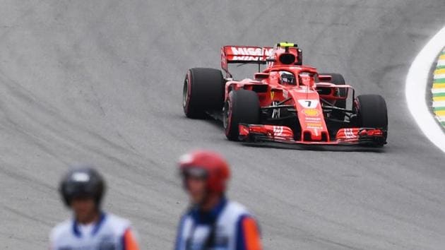 Ferrari's German driver Sebastian Vettel powers his car during the third free practice session of the F1 Brazil Grand Prix, at the Interlagos racetrack in Sao Paulo. (AFP) Ferrari's German driver Sebastian Vettel powers his car during the third free practice session of the F1 Brazil Grand Prix, at the Interlagos racetrack in Sao Paulo. (AFP)