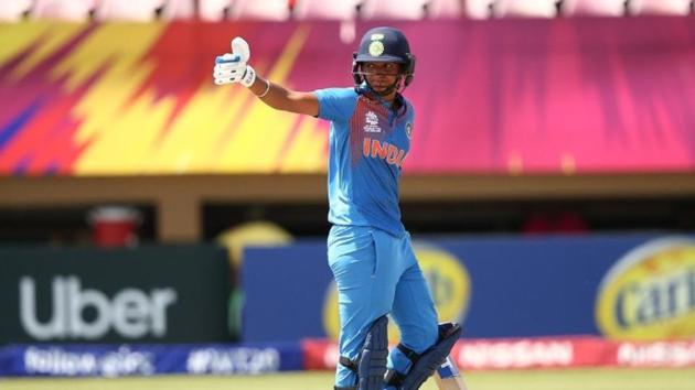 Harmanpreet Kaur celebrates after scoring a century.(ICC)
