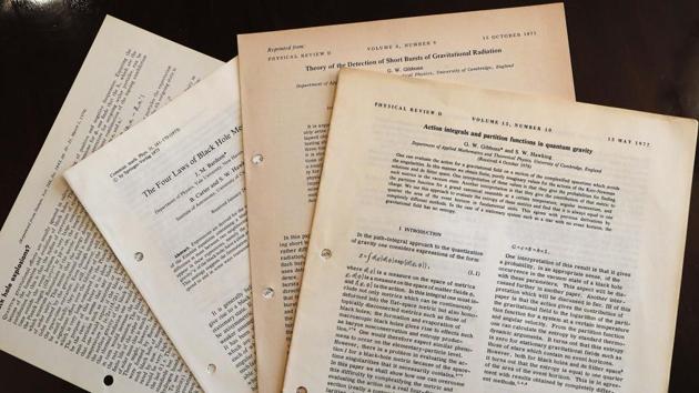 Documents and files by Stephen Hawking. An invitation he sent out to a party held several years previously, a light-hearted experiment to see if any time travellers would turn up, sold for more than 10 times its pre-sale estimate of £100, while a bomber jacket he wore in a 2016 documentary raised £40,000. (Frank Augstein / AP File)